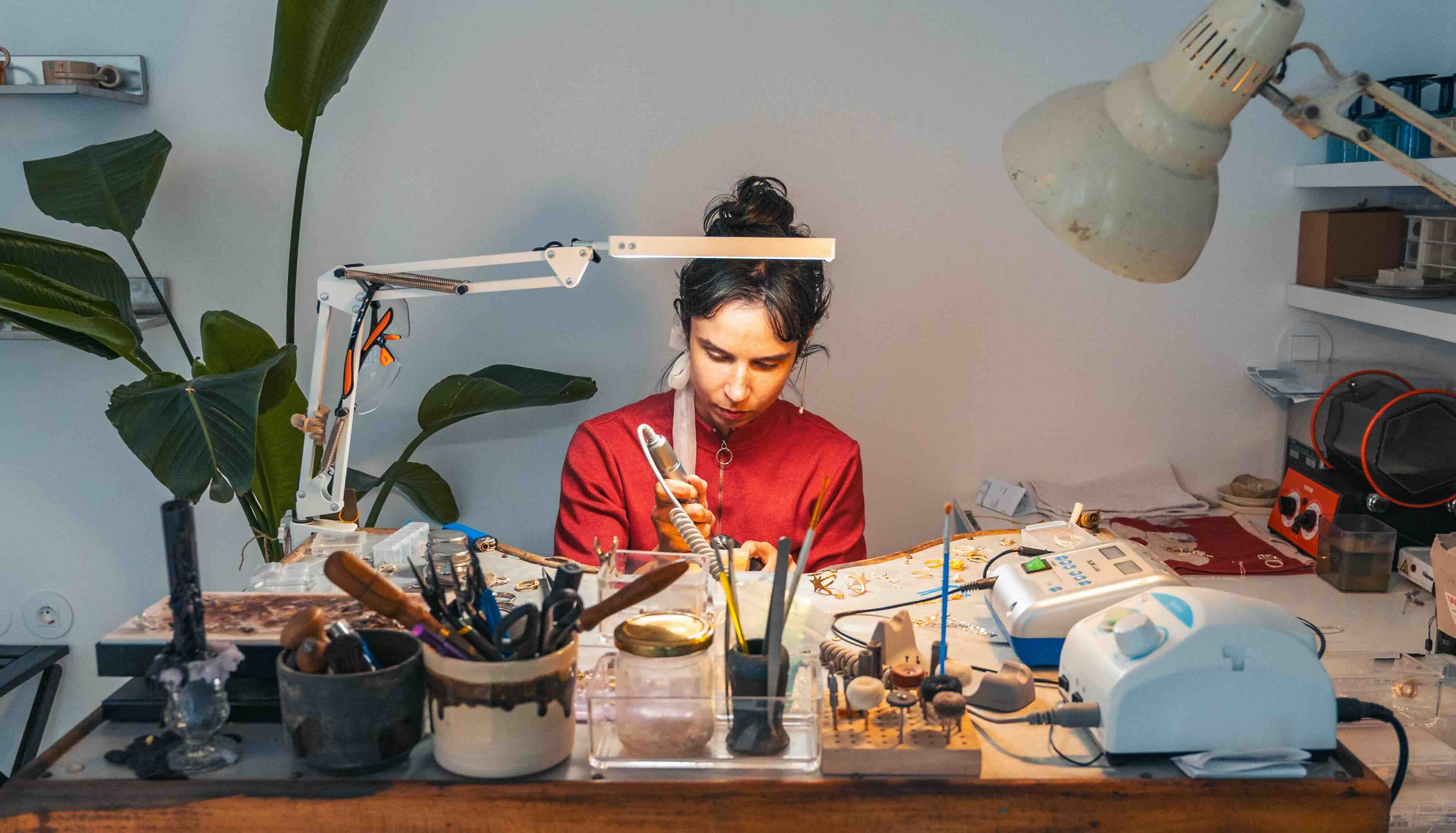 Photograph of Benedetta Grasso working in her studio and shop, Tobe Atelier